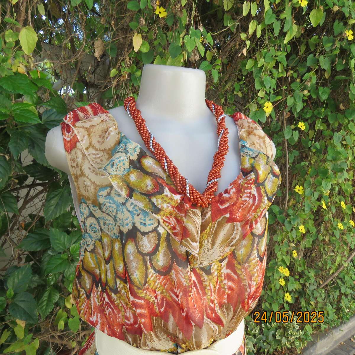 Cool colourful sleeveless dress with frilled V neckline. Size 37. Lined. Elasticated waist.