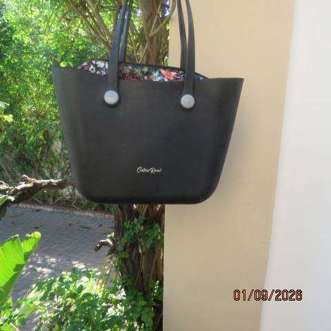 COTTON ROAD matte black heavy PU bag with floral inner lining, zip closure, 42cm x 28cm