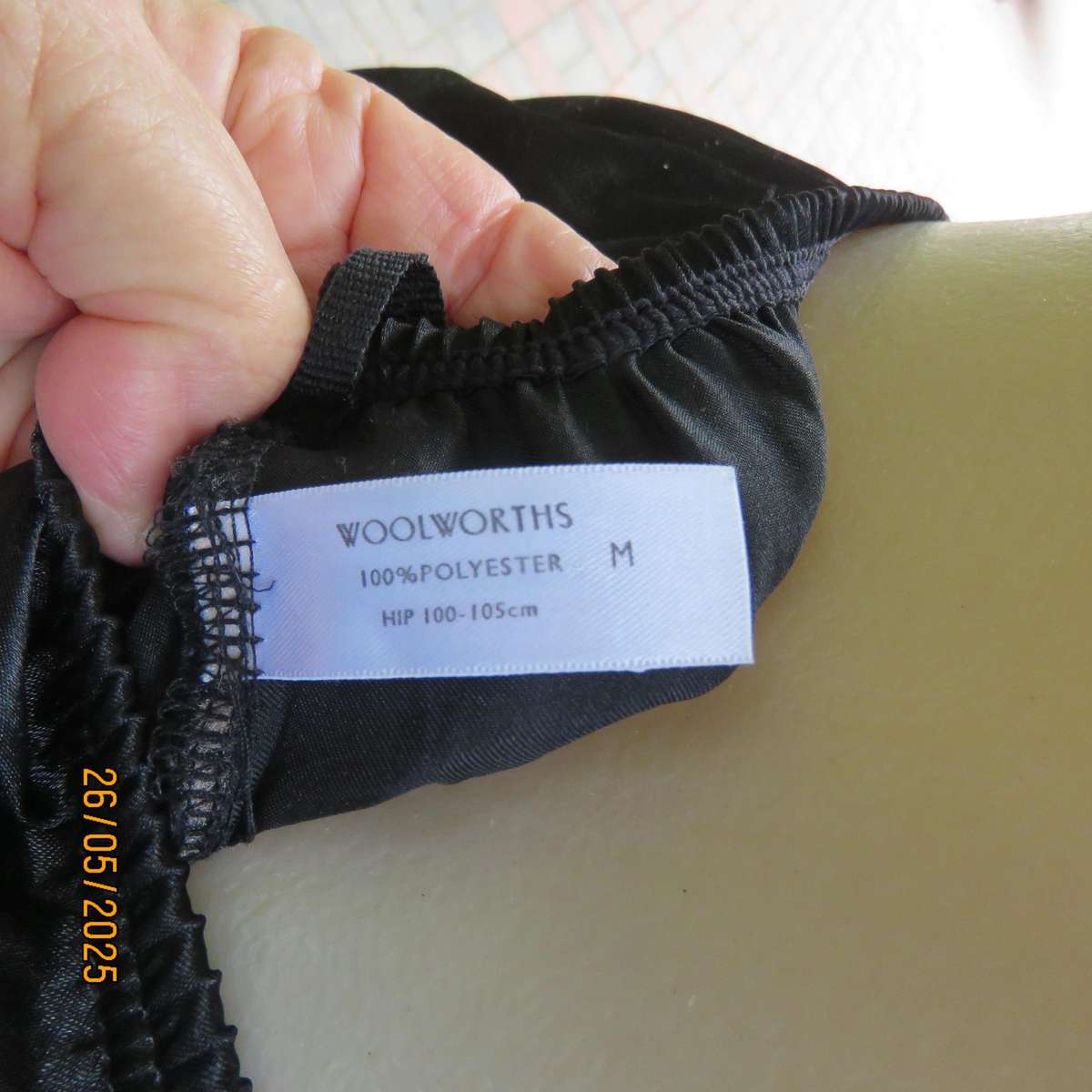 Black 2 pc satin polyester pajama set. Cropped pants-fold over top. Size 36-38