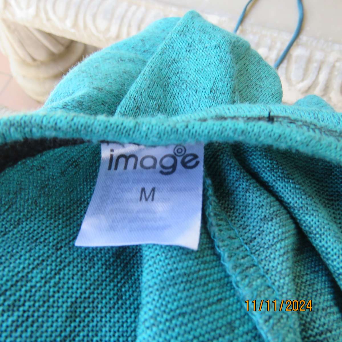 Comfy slip over mottled jade-black polyester stretch size 36 top. Cut-on sleeves. As new cond.