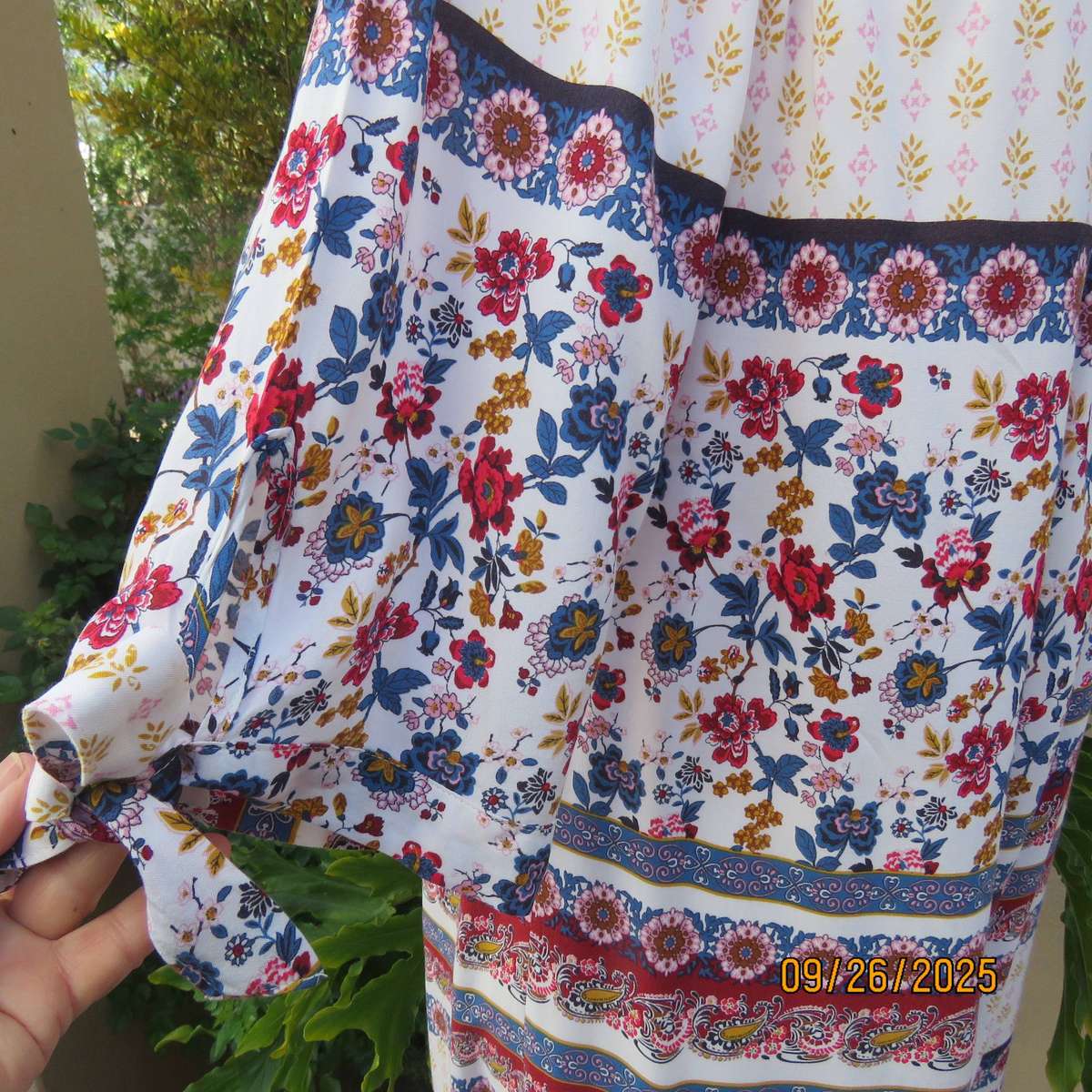 EXACT white viscose with blue-red flowers and horizontal lines. Size 42.
