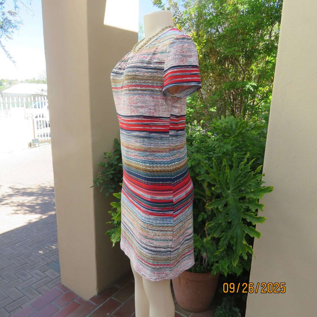 Horizontal stripe patterned red-blue-white with green and gold slip over poly stretch dress. Size 34
