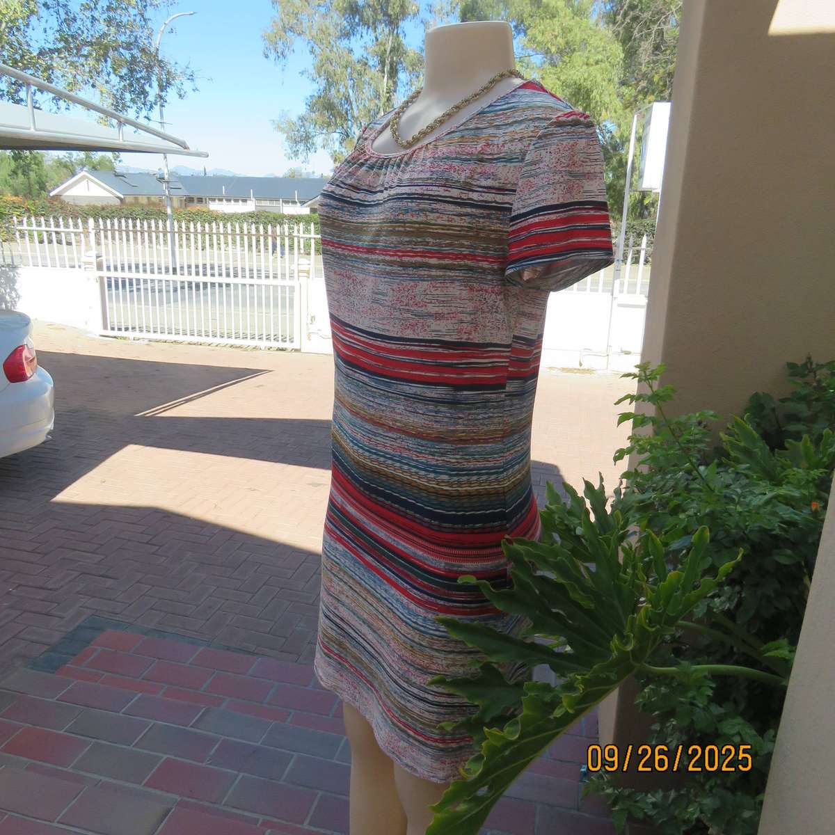 Horizontal stripe patterned red-blue-white with green and gold slip over poly stretch dress. Size 34