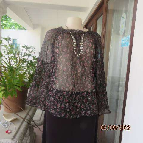 Black crinkled sheer polyester long raglan sleeve top with tiny pink and white floral print size 40
