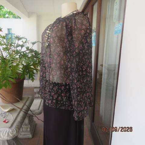 Black crinkled sheer polyester long raglan sleeve top with tiny pink and white floral print size 40