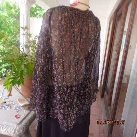 Black crinkled sheer polyester long raglan sleeve top with tiny pink and white floral print size 40