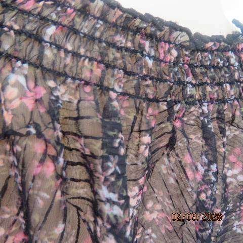 Black crinkled sheer polyester long raglan sleeve top with tiny pink and white floral print size 40