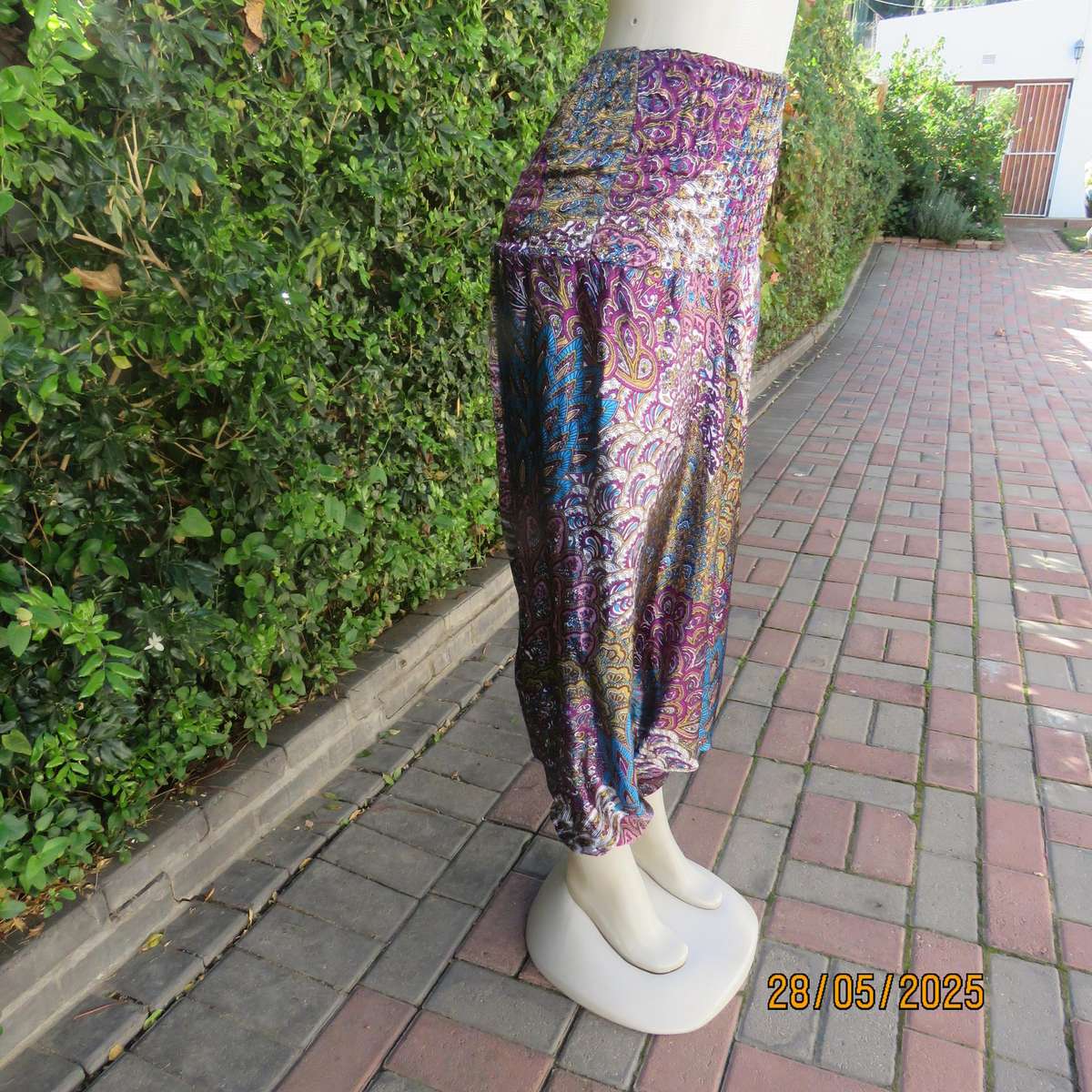 Harem pants in jewel colours with peacock feather patterns. Silky poly-rayon. Size 34-36.