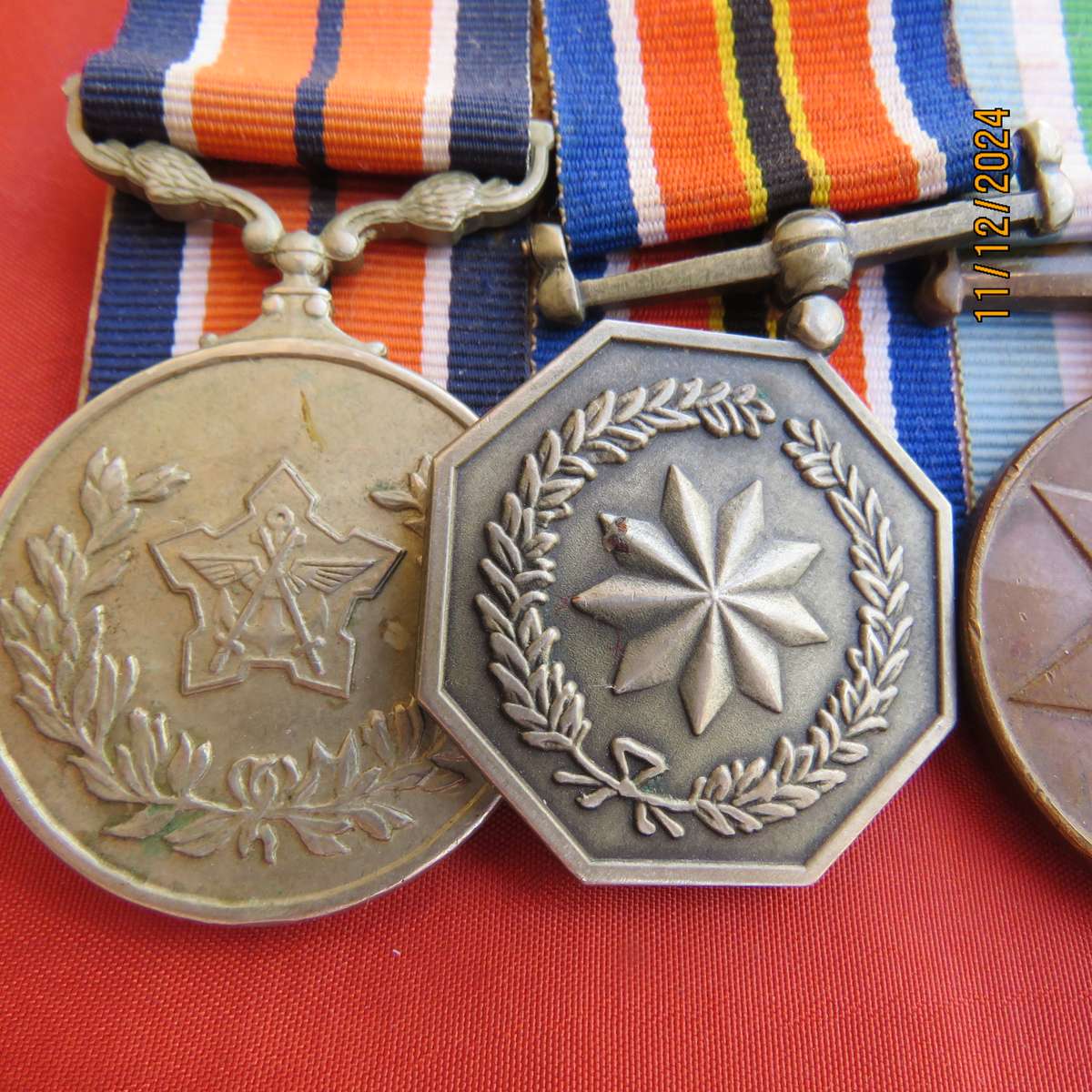 Set of 4 SADF medals with ribbons plus AU medal Burundi. All excellent condition.