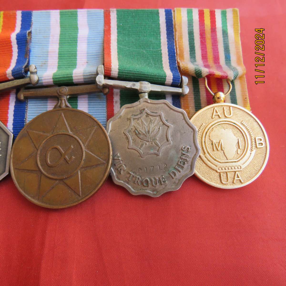 Set of 4 SADF medals with ribbons plus AU medal Burundi. All excellent condition.