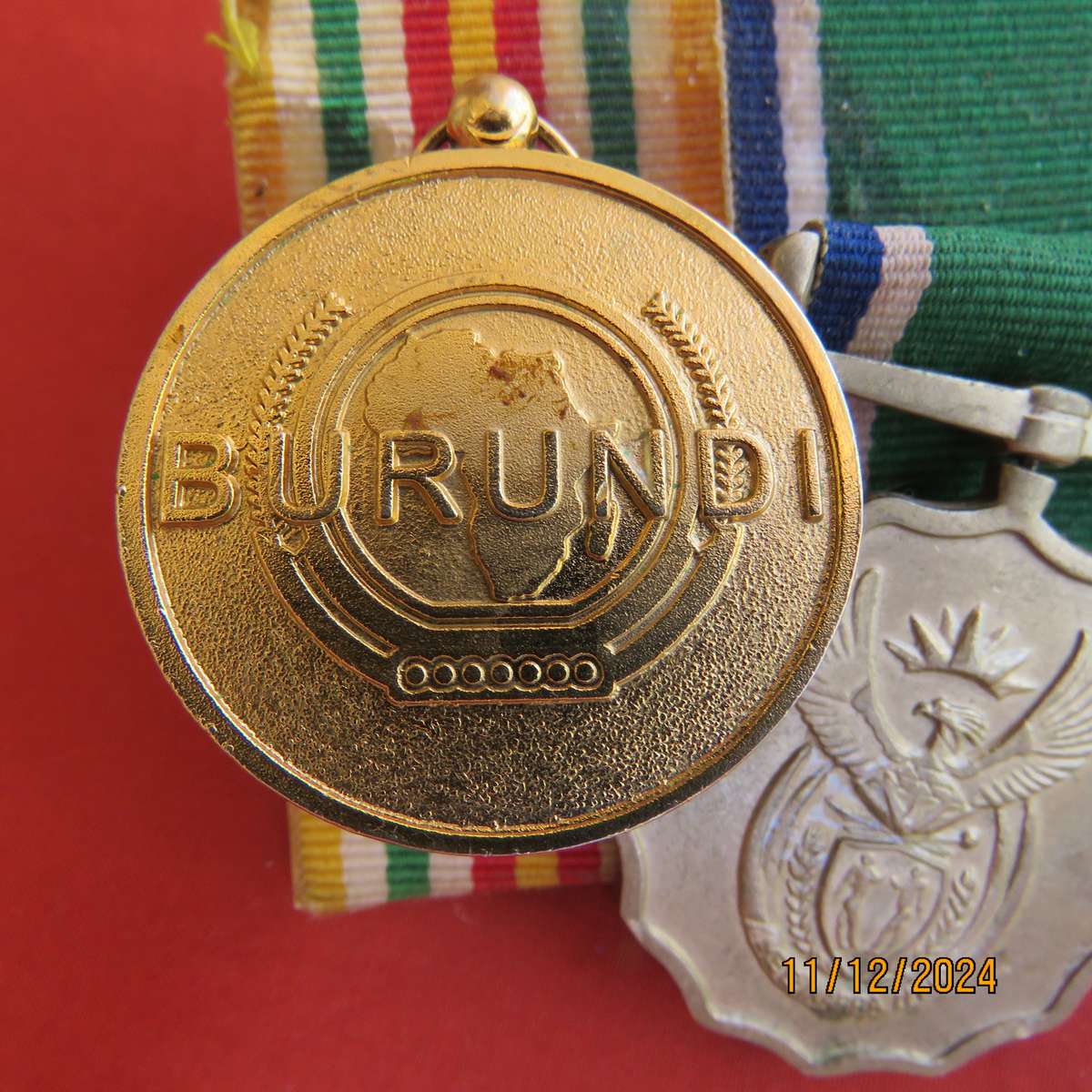 Set of 4 SADF medals with ribbons plus AU medal Burundi. All excellent condition.
