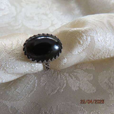Black oval onyx ring in 925 sterling silver setting, size 8
