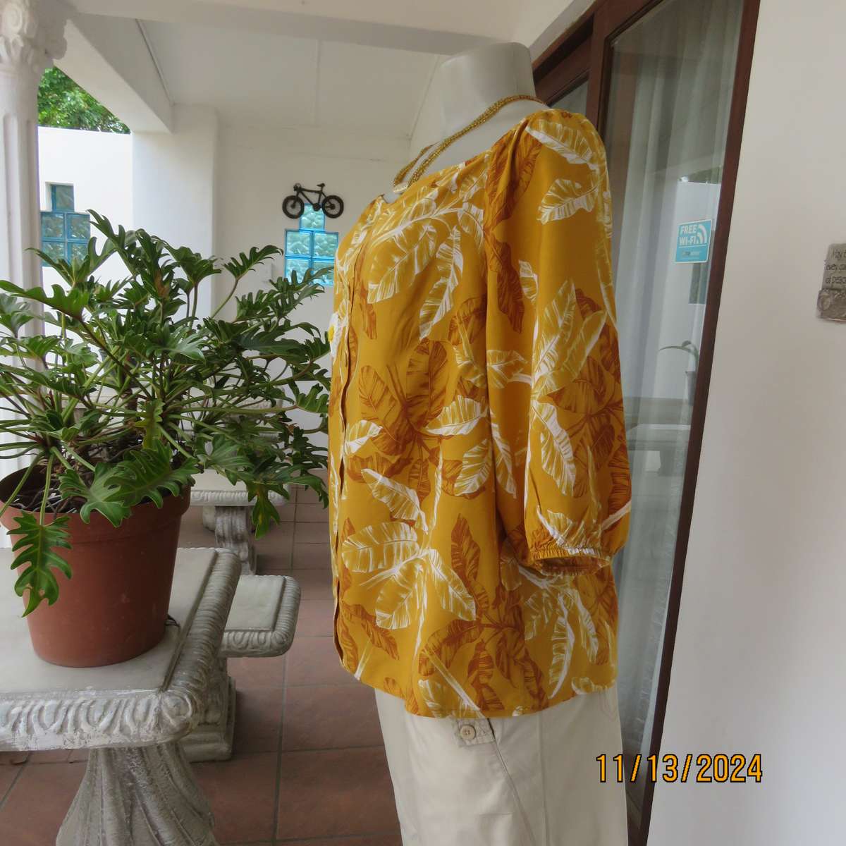 Summertime chic mustard with white-rust leaf design slip over top. Size 42 by RED. Off the shoulder