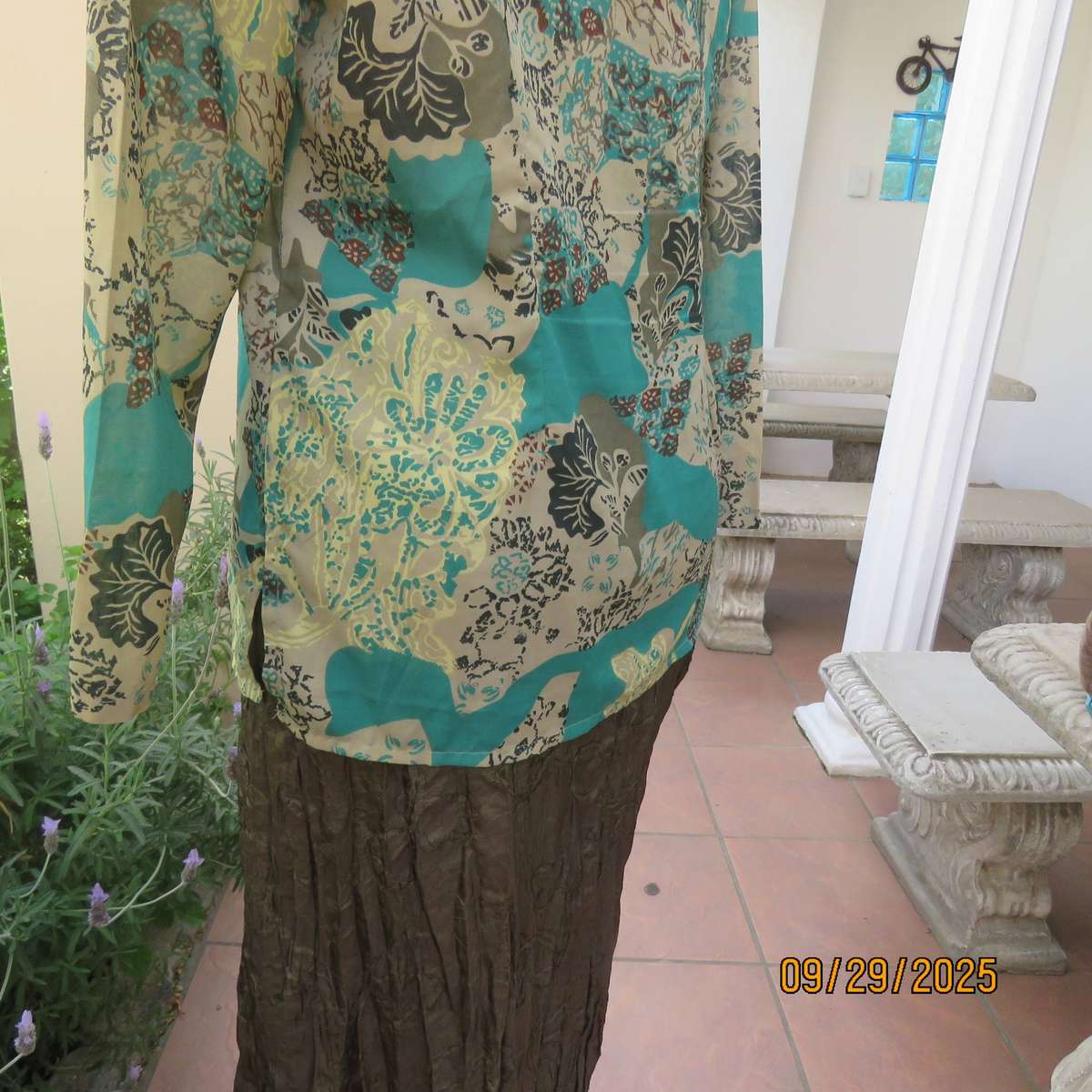 Colourful long sleeve polyester top with green bead decoration. Size 36
