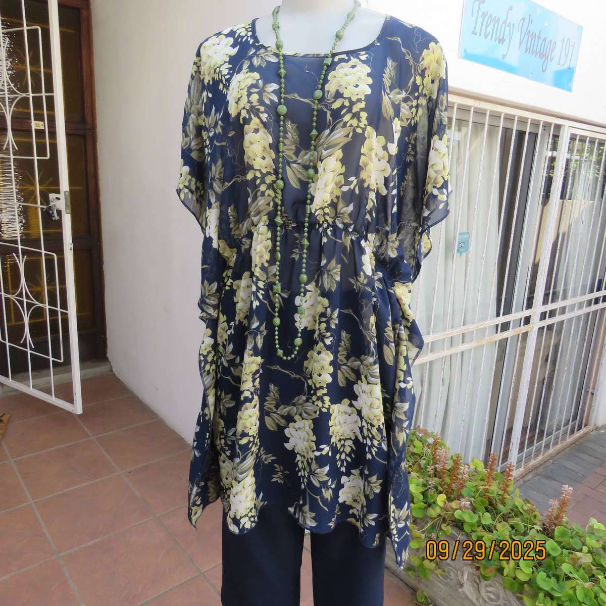 T&M long navy sheer polyester slip over top with pale yellow-green flowers, Size 38-40.