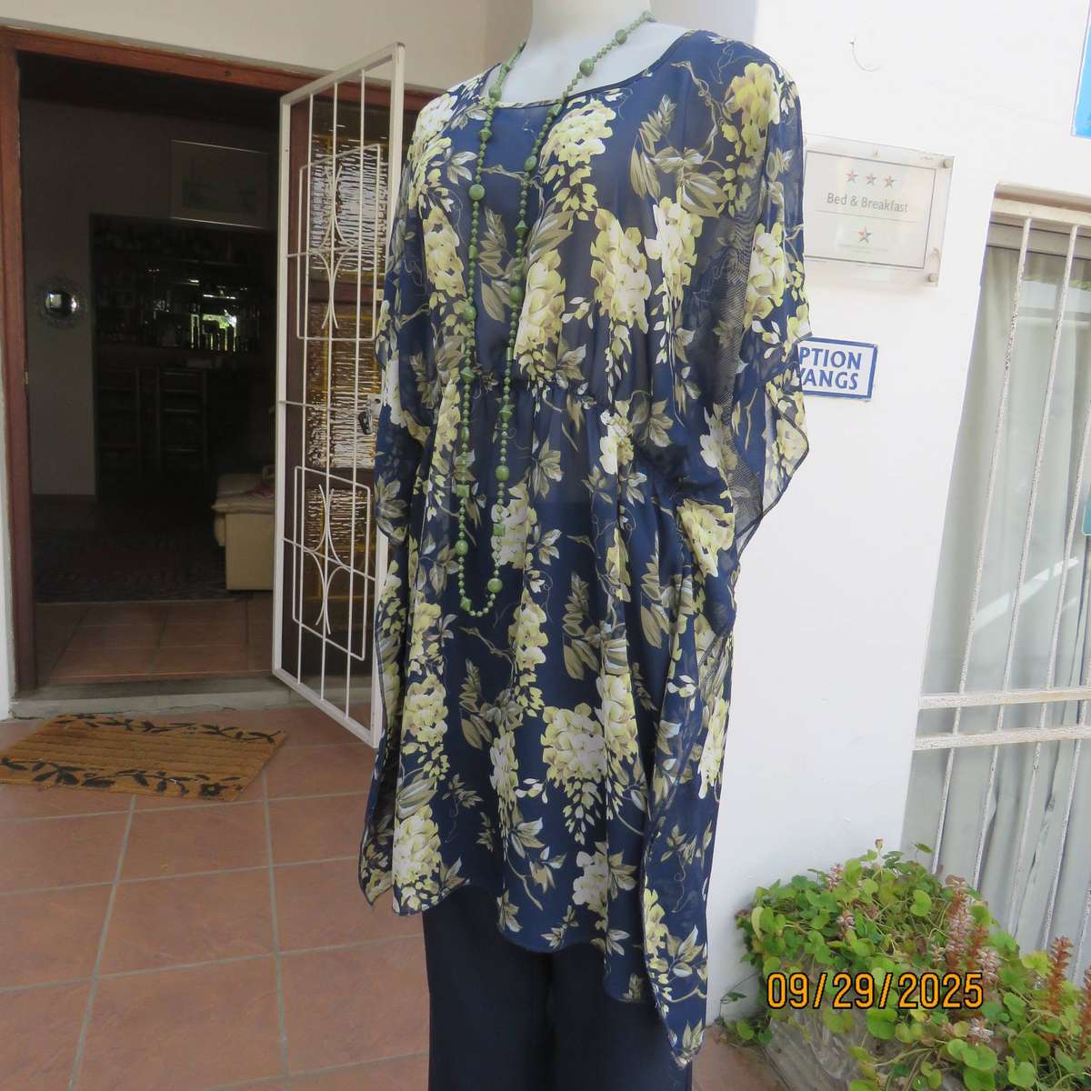 T&M long navy sheer polyester slip over top with pale yellow-green flowers, Size 38-40.