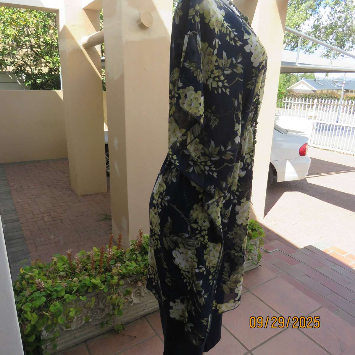 T&M long navy sheer polyester slip over top with pale yellow-green flowers, Size 38-40.