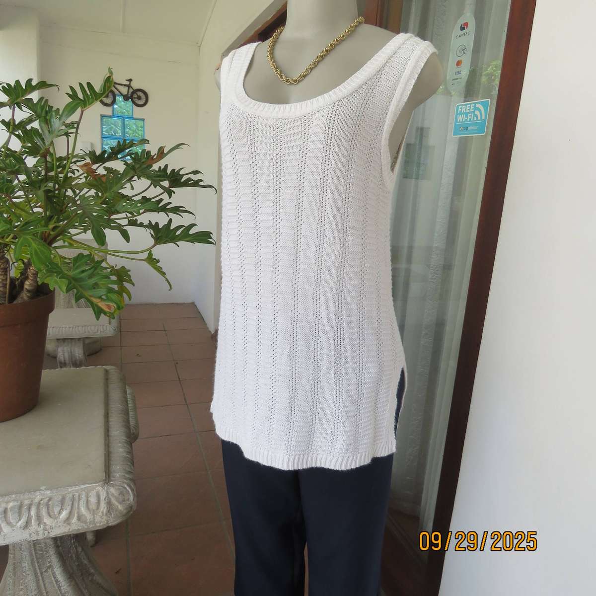 OASIS white long acrylic knit sleeveless slip over top. Slitted sides. Size 38