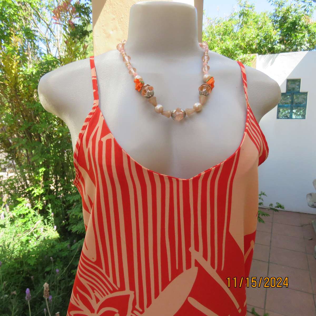 Burnt orange and peach graphic print strappy dress size 36. Textured polyester