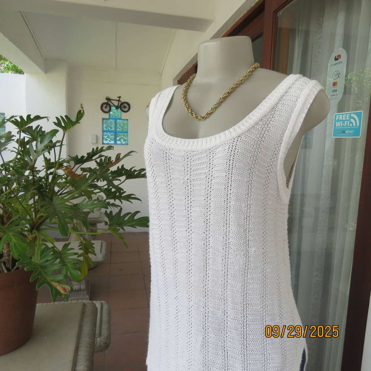 OASIS white long acrylic knit sleeveless slip over top. Slitted sides. Size 38