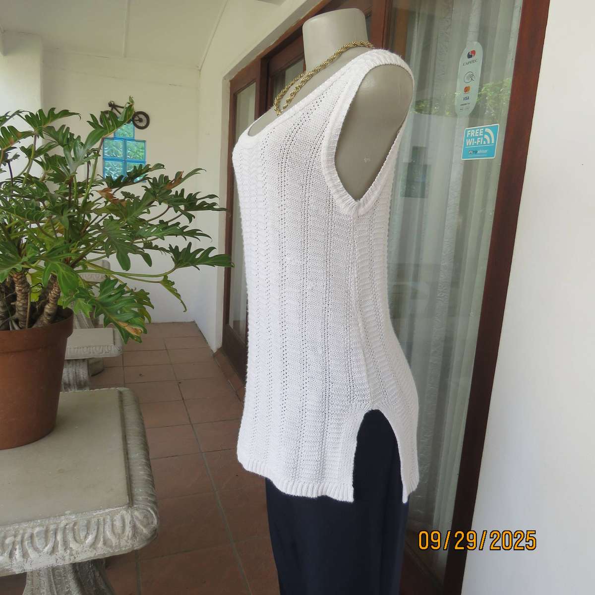 OASIS white long acrylic knit sleeveless slip over top. Slitted sides. Size 38