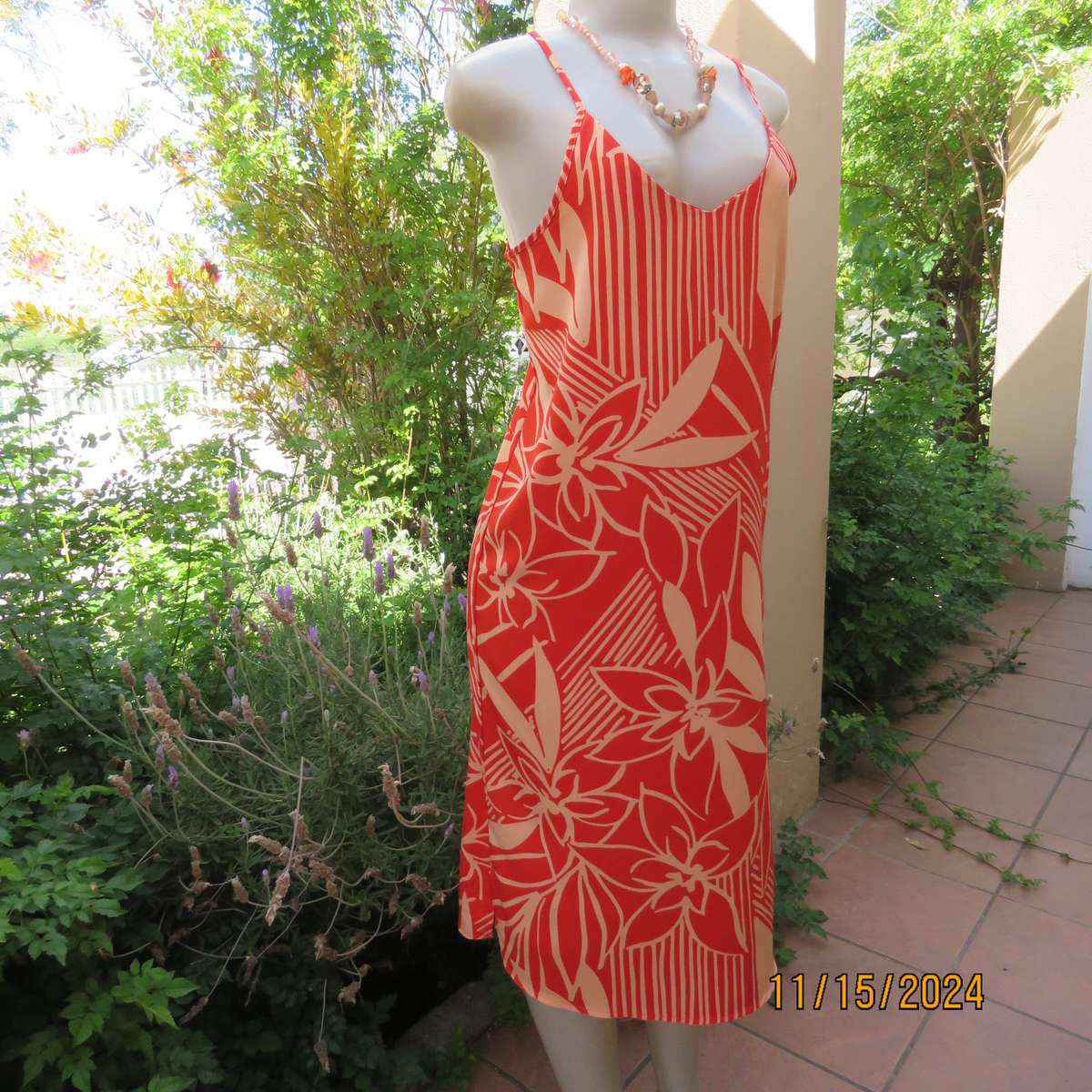 Burnt orange and peach graphic print strappy dress size 36. Textured polyester