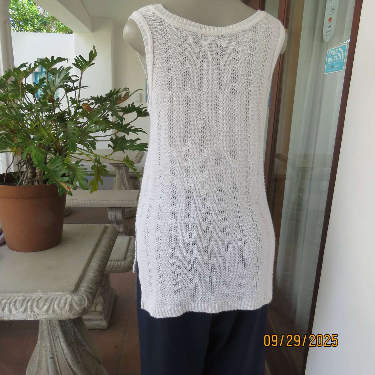 OASIS white long acrylic knit sleeveless slip over top. Slitted sides. Size 38