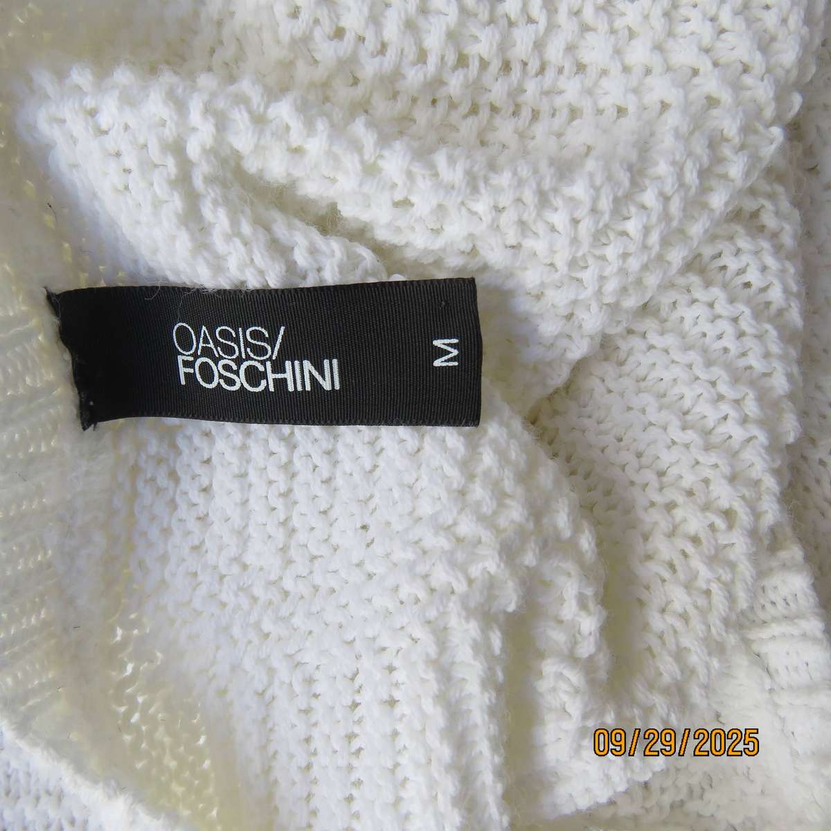 OASIS white long acrylic knit sleeveless slip over top. Slitted sides. Size 38