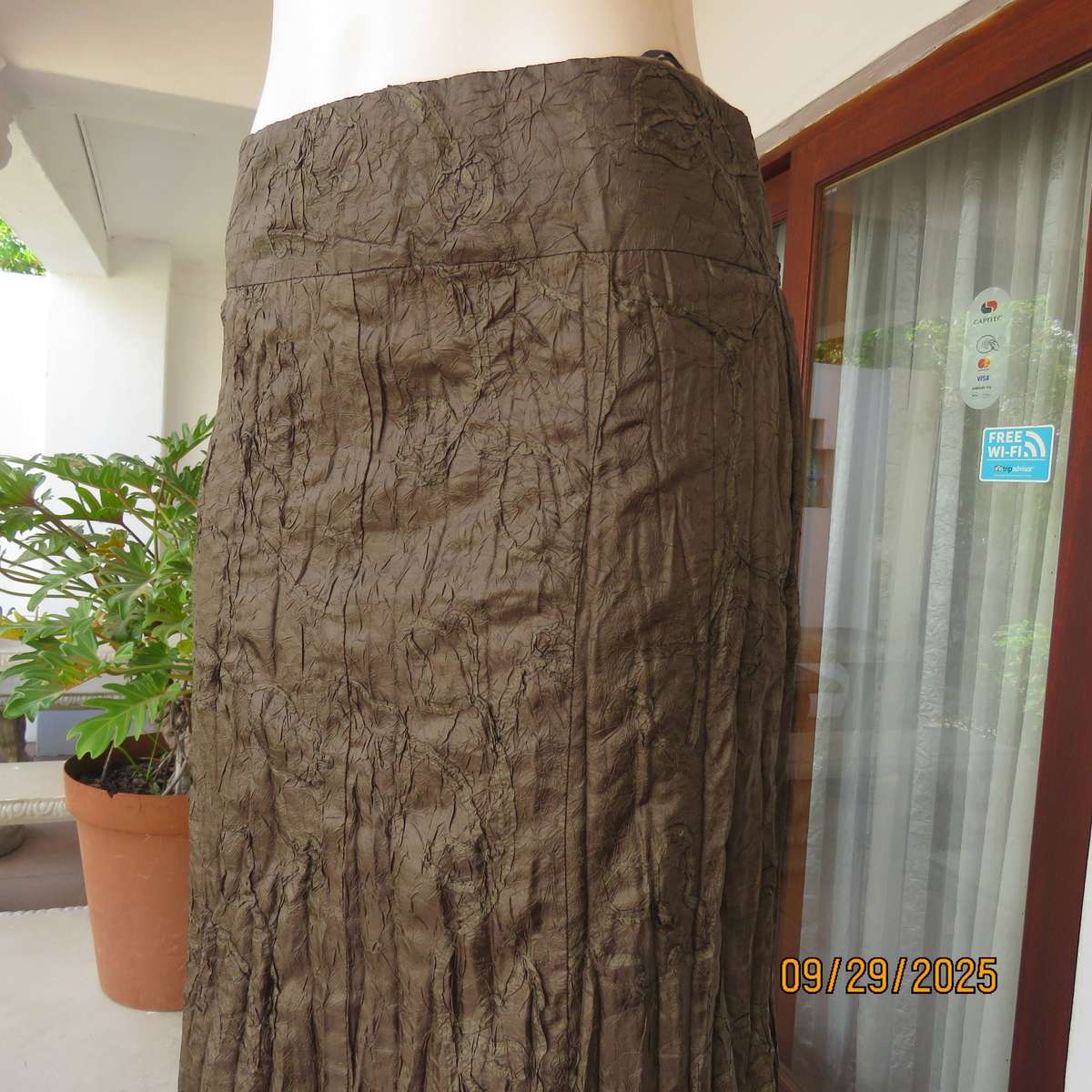 EXACT very dark olive green embossed vertically creased lined skirt. Size 34