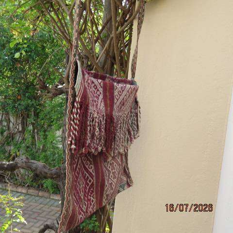 Handmade woven jacquard tote bag with maroon, beige, and green stripe pattern