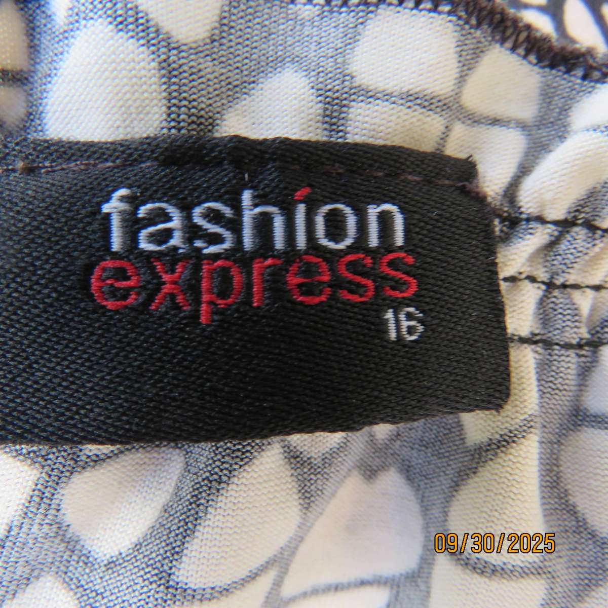 FASHION EXPRESS cream and black stretch polyester dress. Fold over bust. Elasticated waist. Size 40