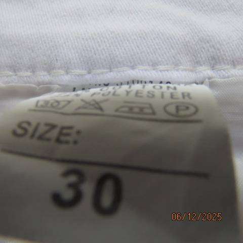 Men's white polycotton stretch skinny jeans in size 30.