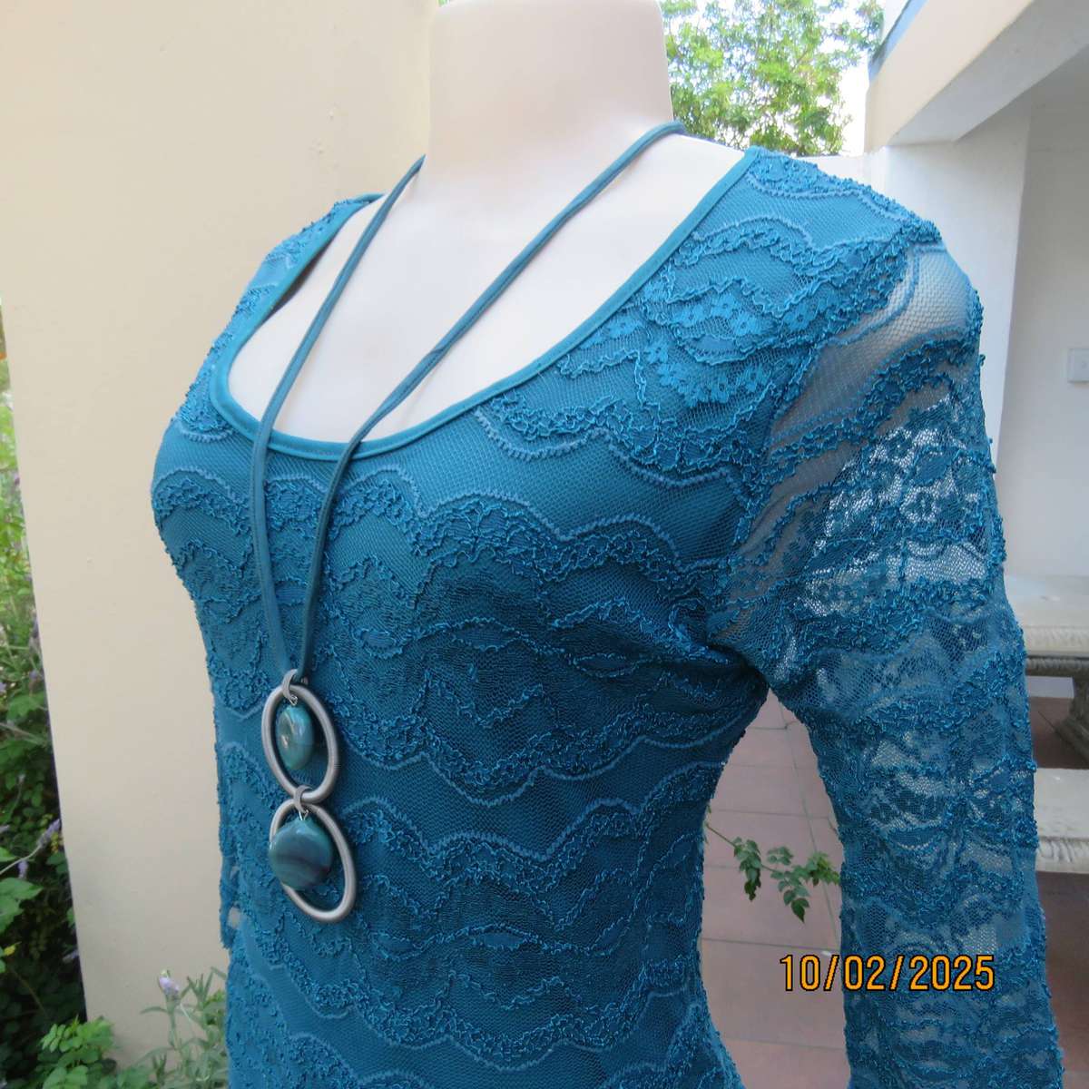 Jade stretch polyester lace bodycon dress with stretch lining. Bracelet length sleeves. Size 34