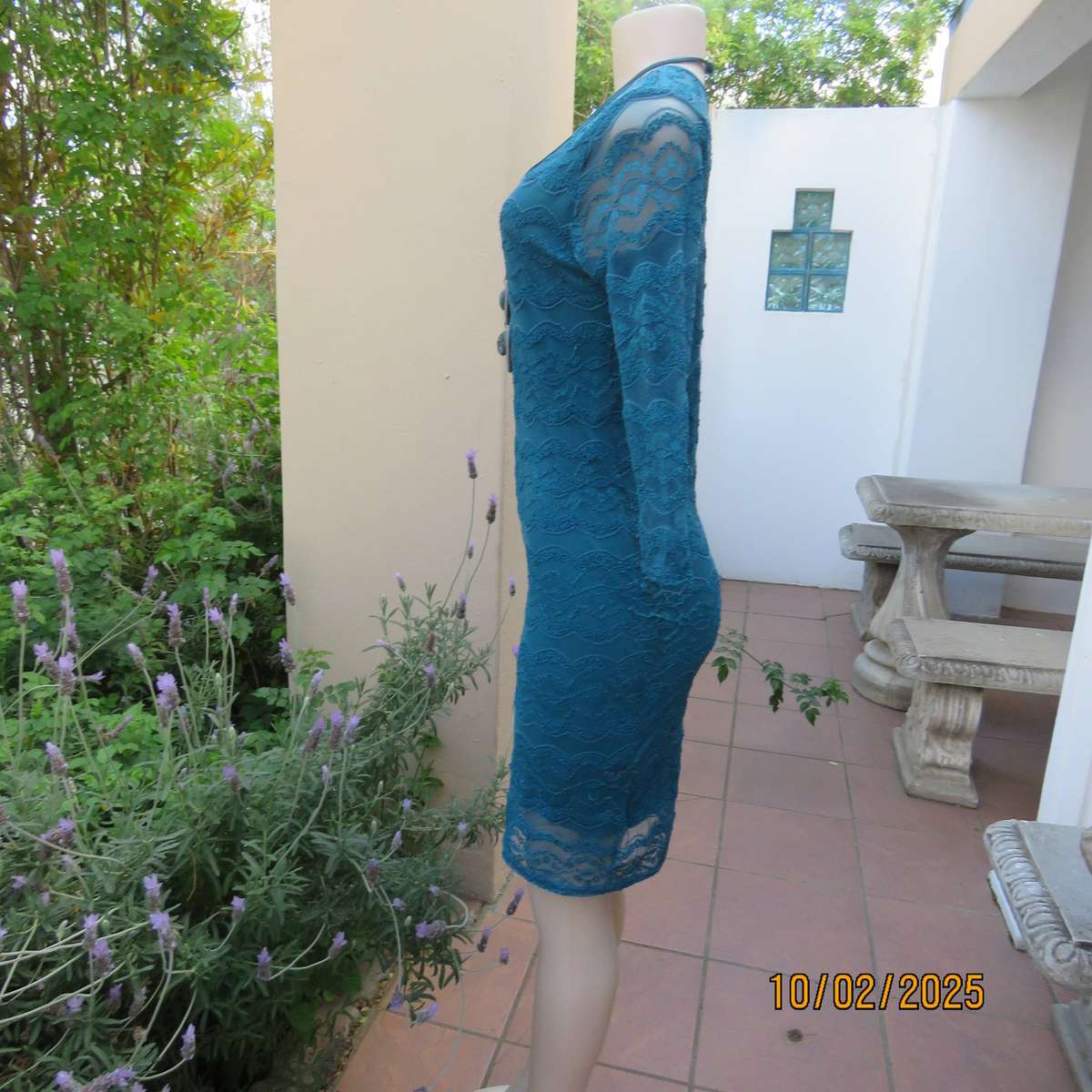 Jade stretch polyester lace bodycon dress with stretch lining. Bracelet length sleeves. Size 34