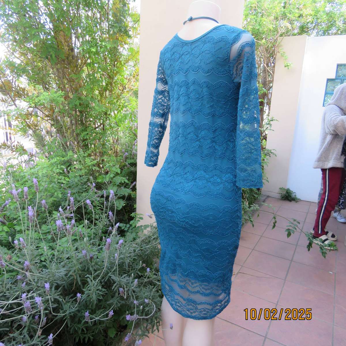 Jade stretch polyester lace bodycon dress with stretch lining. Bracelet length sleeves. Size 34