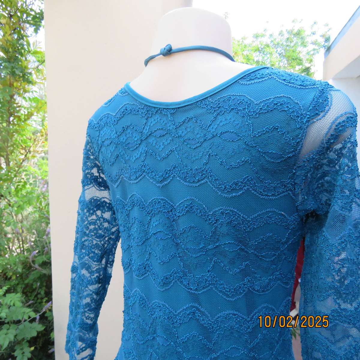 Jade stretch polyester lace bodycon dress with stretch lining. Bracelet length sleeves. Size 34