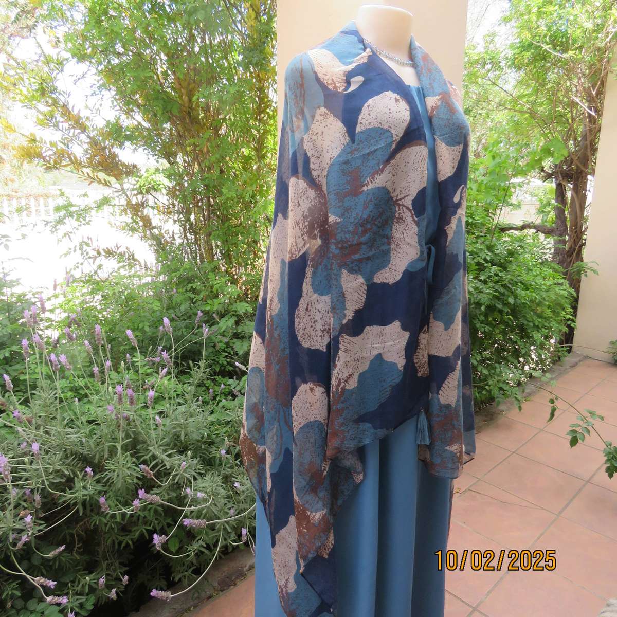 Soft polyester wrap in blues-cream and light brown print. 90cm x 180cm. New