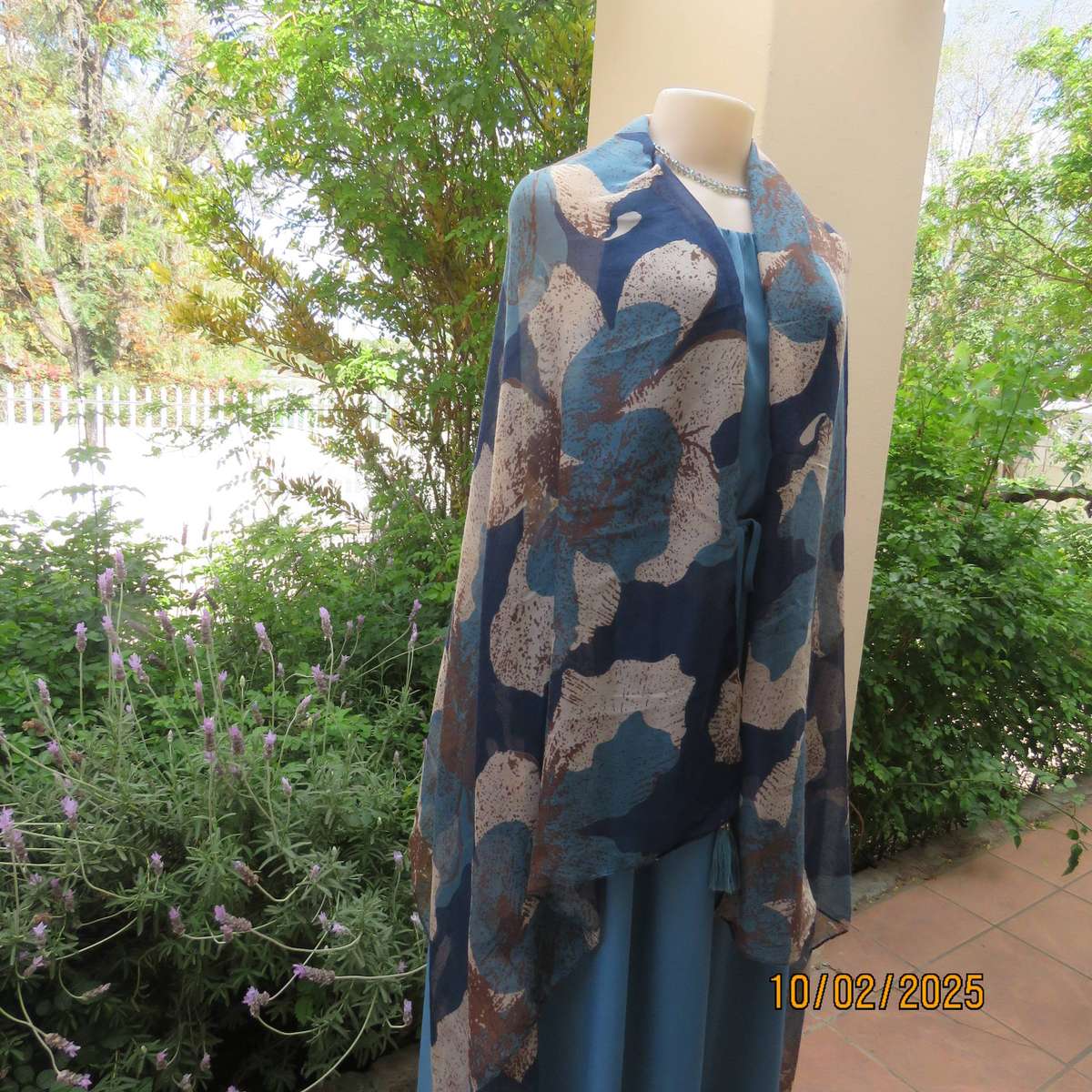 Soft polyester wrap in blues-cream and light brown print. 90cm x 180cm. New