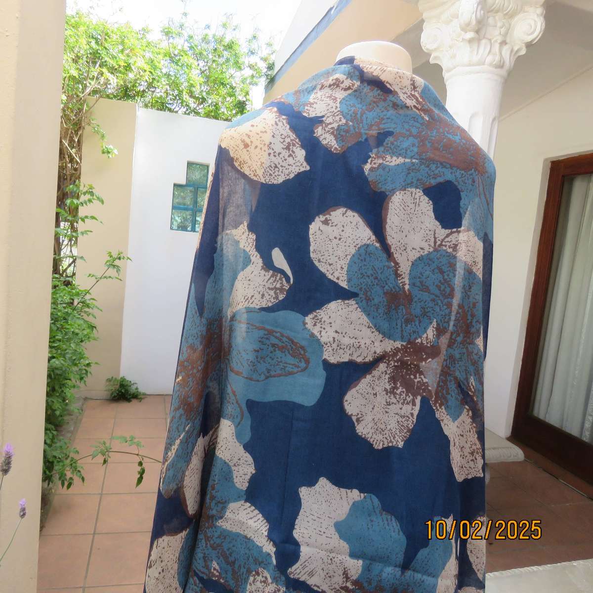 Soft polyester wrap in blues-cream and light brown print. 90cm x 180cm. New
