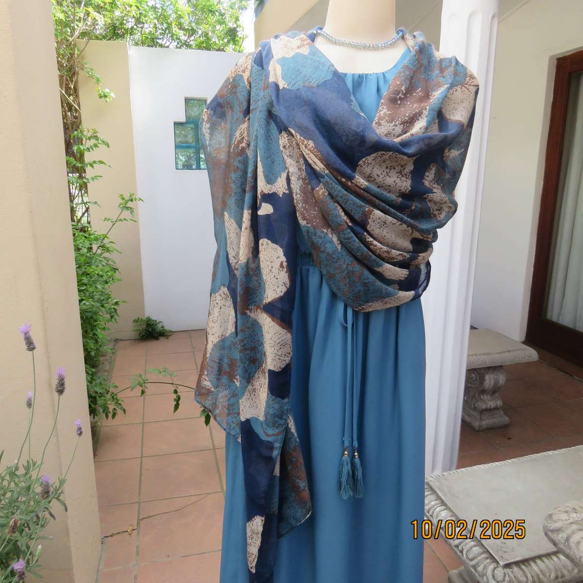 Soft polyester wrap in blues-cream and light brown print. 90cm x 180cm. New