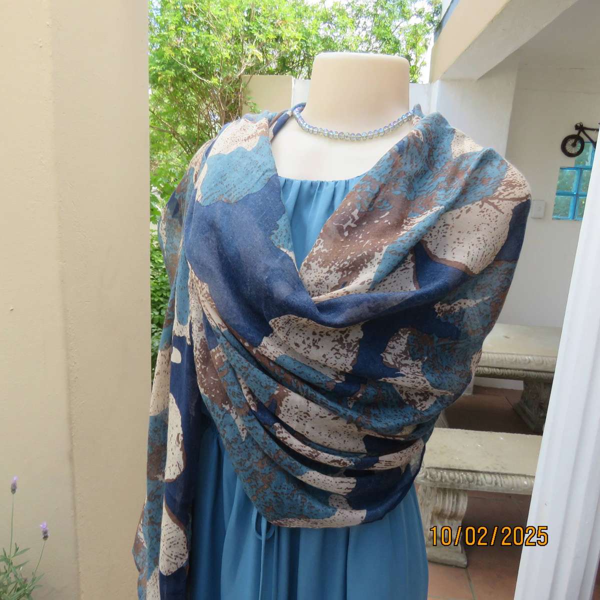 Soft polyester wrap in blues-cream and light brown print. 90cm x 180cm. New