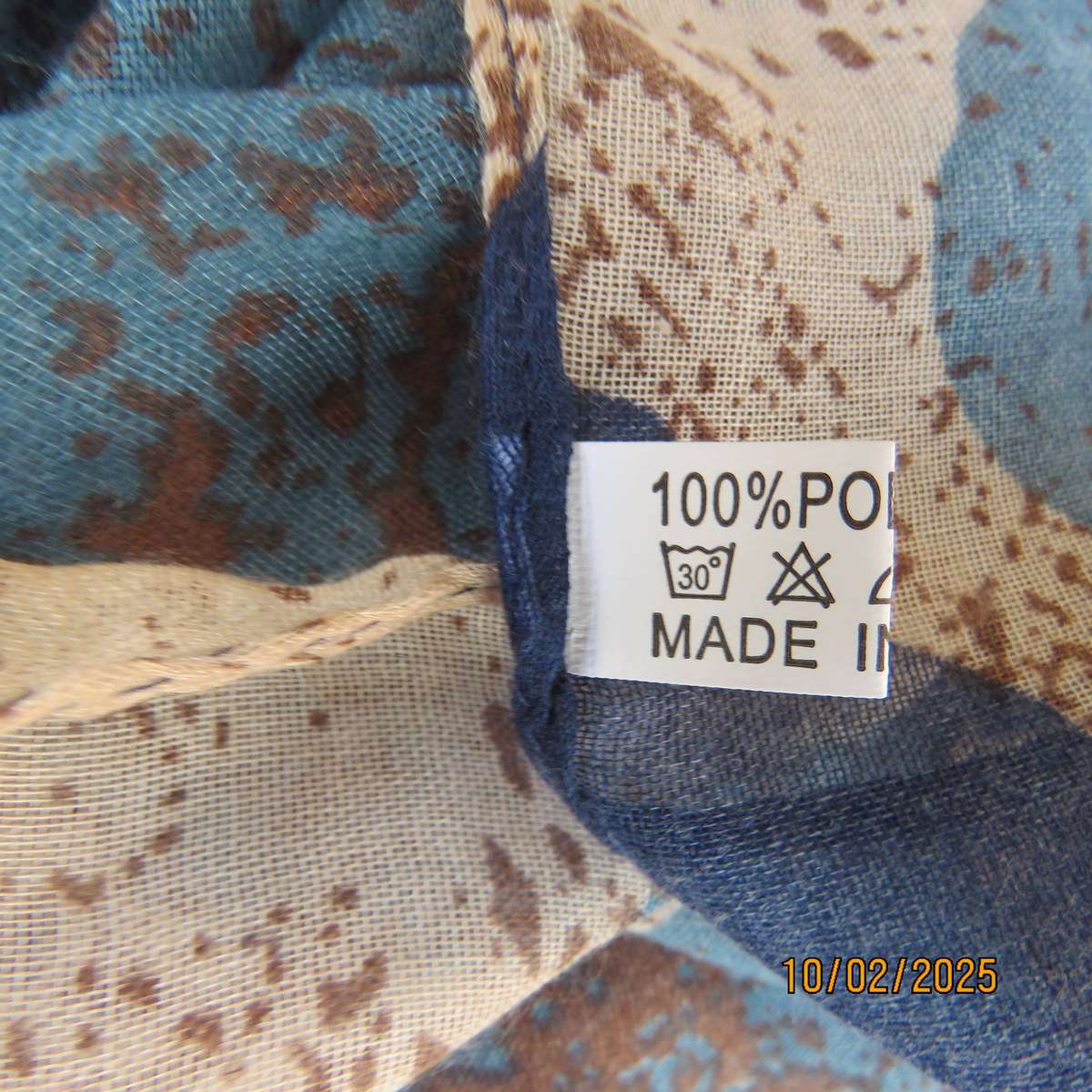 Soft polyester wrap in blues-cream and light brown print. 90cm x 180cm. New