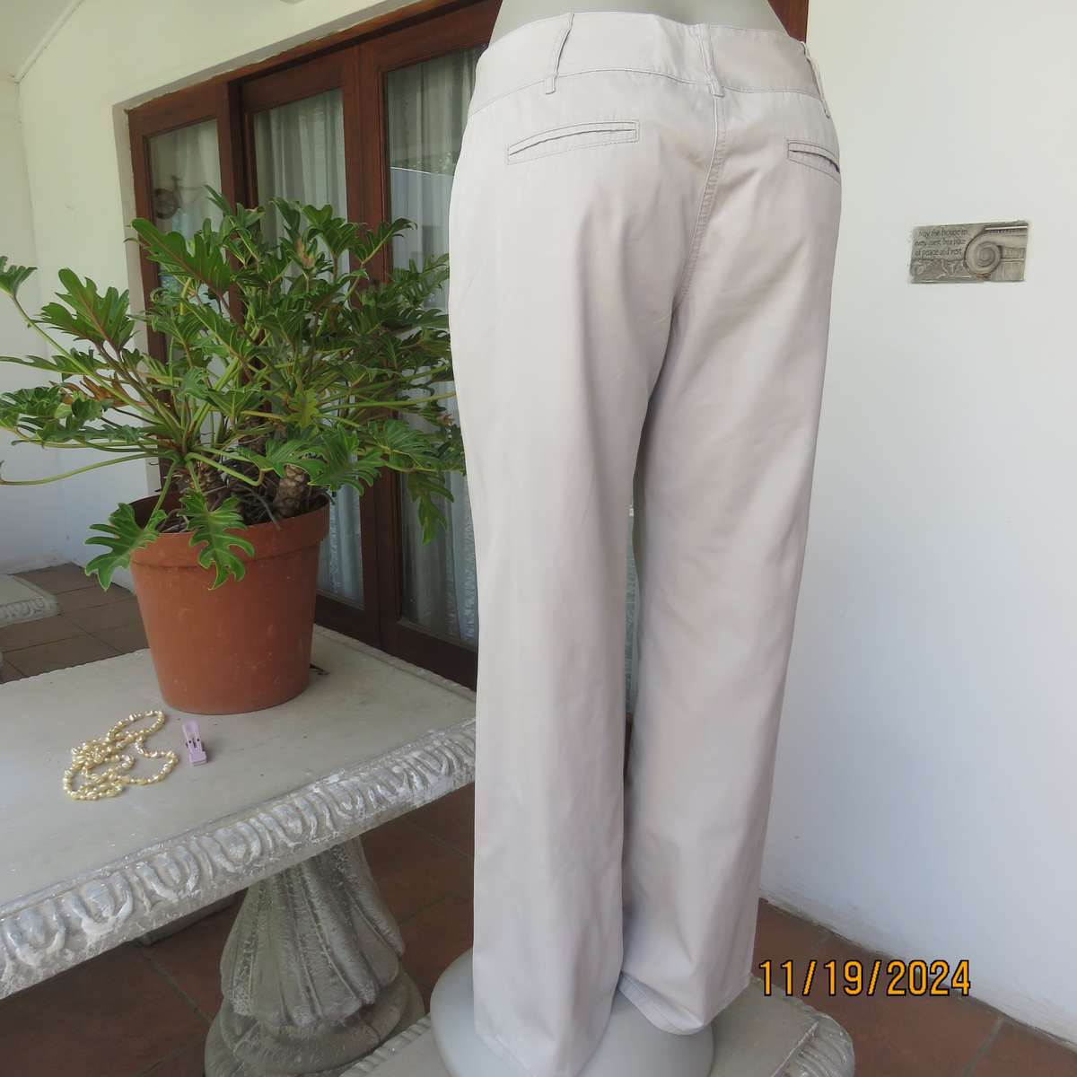 WOOLWORTHS top of the line bootlegged beige cotton pants size 36.