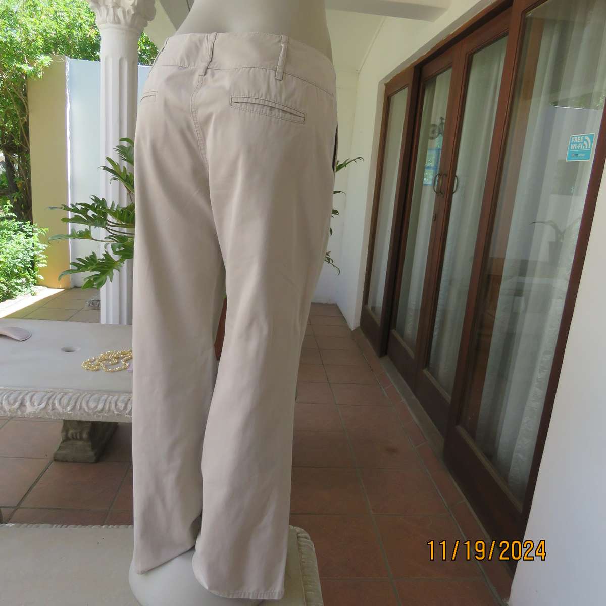 WOOLWORTHS top of the line bootlegged beige cotton pants size 36.