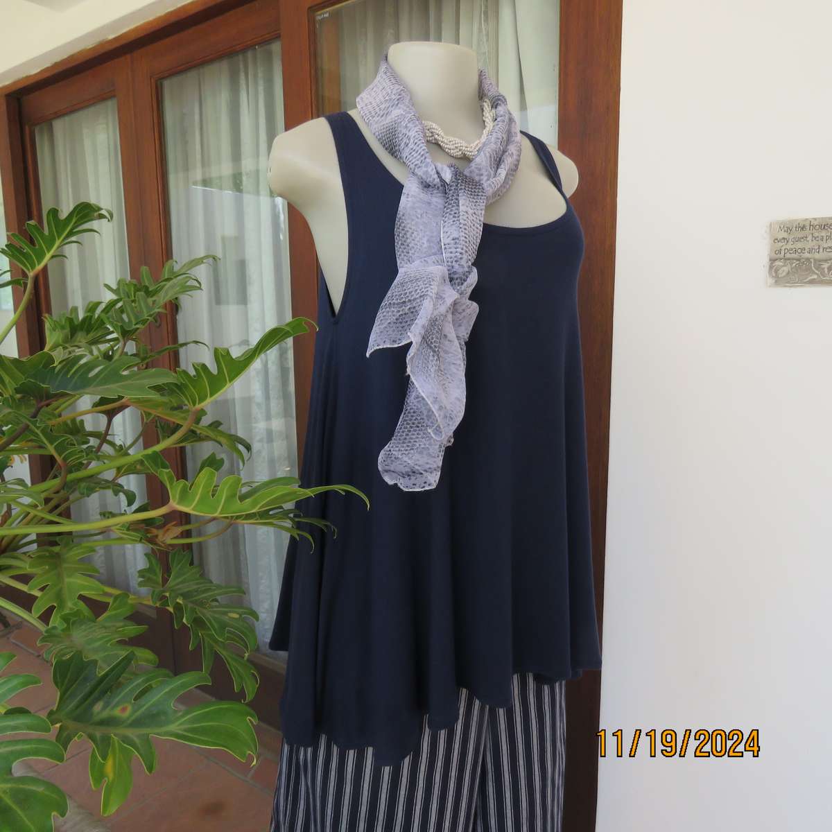 EARTH ANGEL navy blue extra wide cut sleeveless top with scooped neckline.Size 38.In stretch viscose