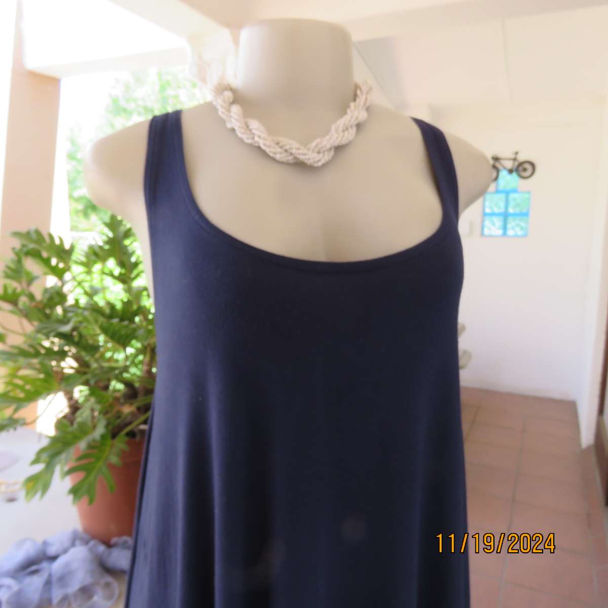 EARTH ANGEL navy blue extra wide cut sleeveless top with scooped neckline.Size 38.In stretch viscose