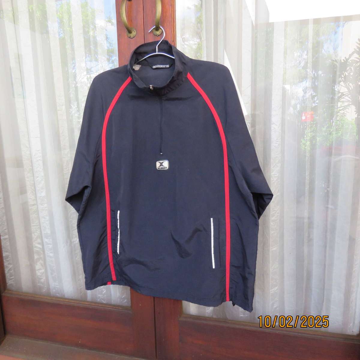 GILBERT navy nylon slip over weather proof long sleeve top. Size XXL. Short front Zip