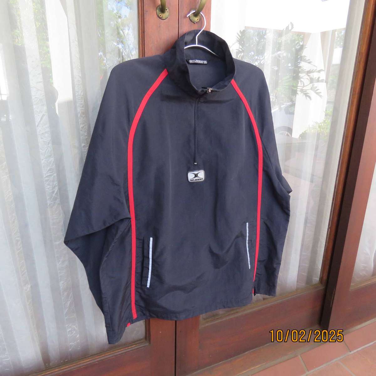 GILBERT navy nylon slip over weather proof long sleeve top. Size XXL. Short front Zip