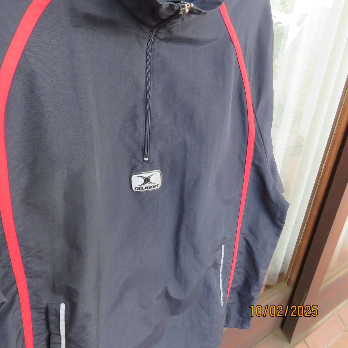 GILBERT navy nylon slip over weather proof long sleeve top. Size XXL. Short front Zip