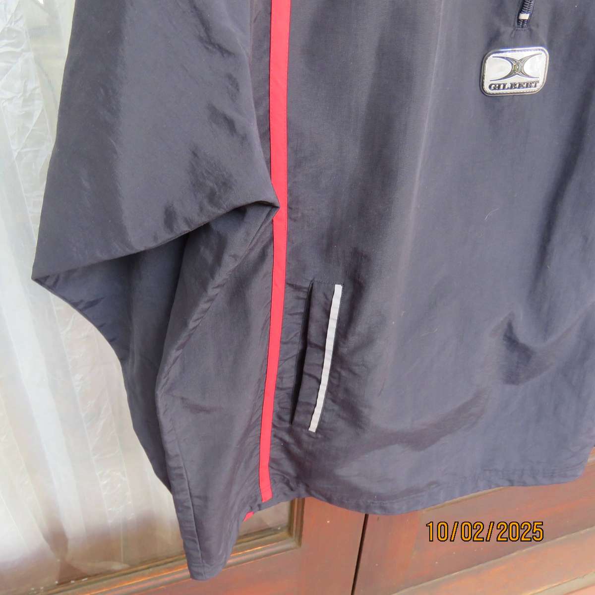 GILBERT navy nylon slip over weather proof long sleeve top. Size XXL. Short front Zip